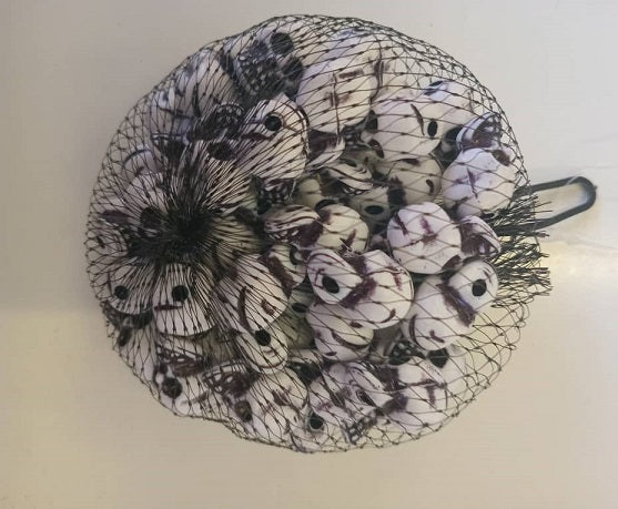 Halloween - Mini skulls in mesh bag